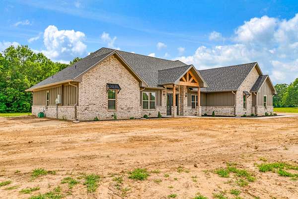 2 Acres of Land with Home for Sale in Blossom, Texas