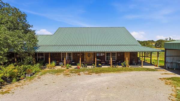 111 Acres of Land with Home for Sale in Brock, Texas