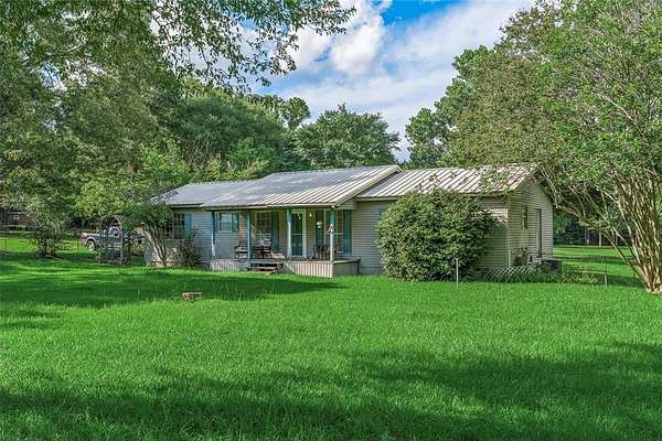 9.62 Acres of Land with Home for Sale in Benton, Louisiana