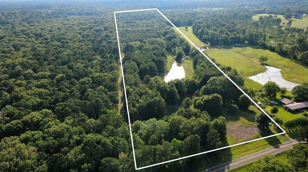 33.6 Acres of Recreational Land with Home for Sale in Shelbyville, Texas