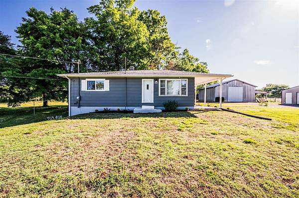 4.5 Acres of Land with Home for Auction in Fountain Run, Kentucky