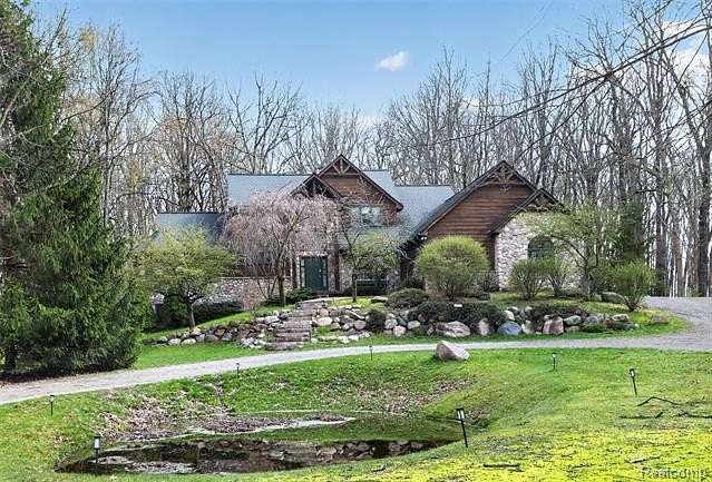 4.57 Acres of Land with Home for Sale in Highland Township, Michigan