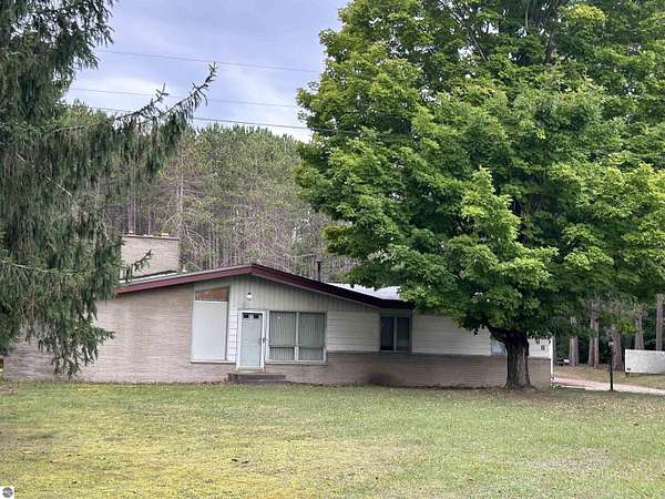 5 Acres of Land with Home for Sale in Bellaire, Michigan