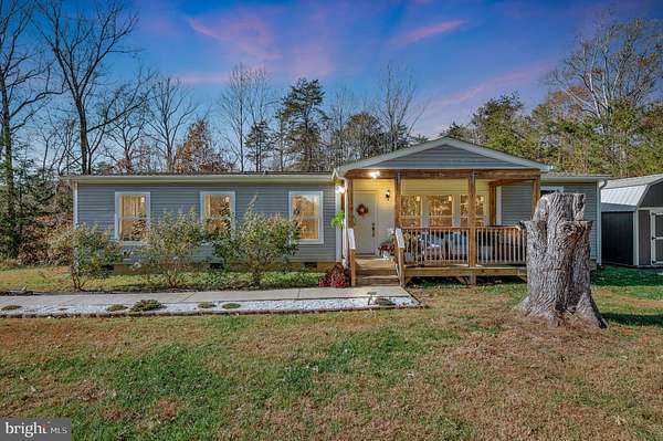 6.26 Acres of Land with Home for Sale in Rhoadesville, Virginia