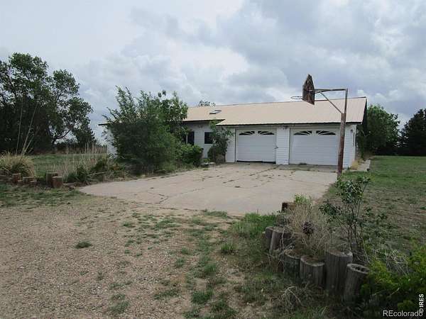 5 Acres of Land with Home for Sale in Joes, Colorado
