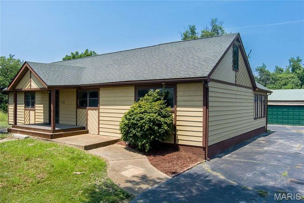 8.2 Acres of Land with Home for Sale in Edwardsville, Illinois