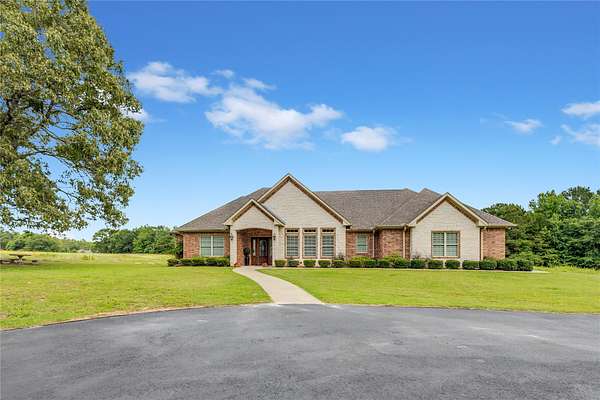 2.42 Acres of Land with Home for Sale in Quitman, Texas