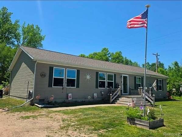 3 Acres of Land with Home for Sale in Lincoln Township, Michigan