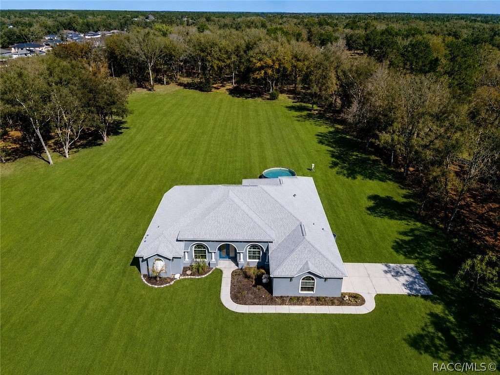 4.67 Acres of Land with Home for Sale in Dunnellon, Florida