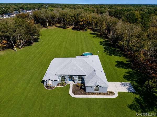 4.67 Acres of Land with Home for Sale in Dunnellon, Florida