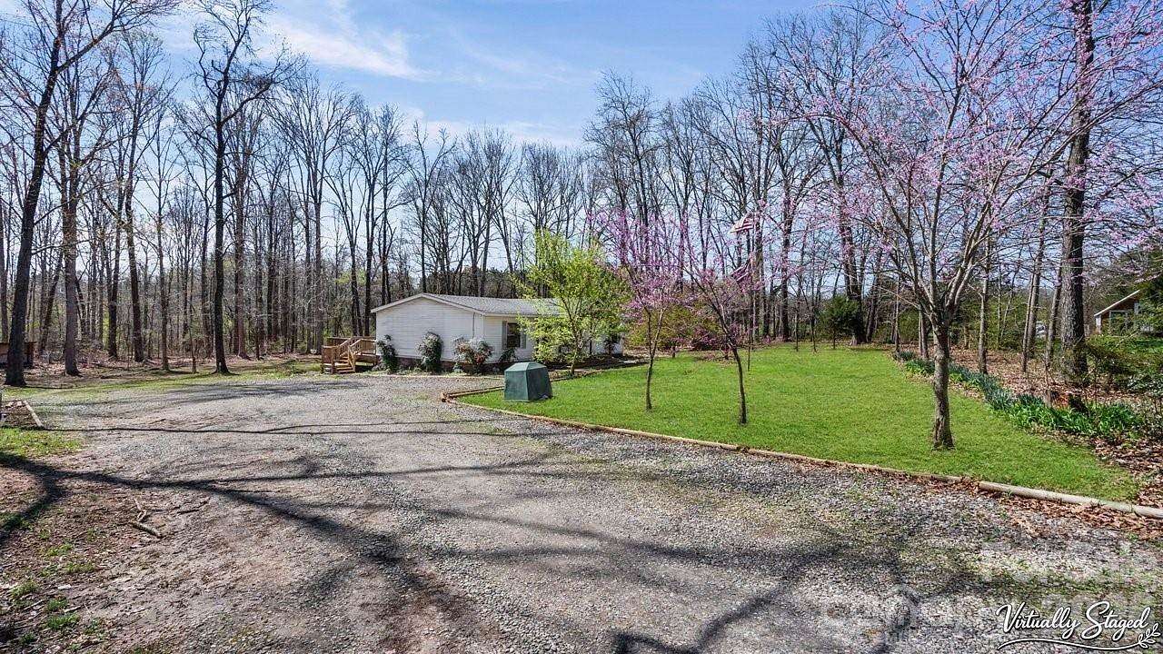 6.83 Acres of Land with Home for Sale in Statesville, North Carolina