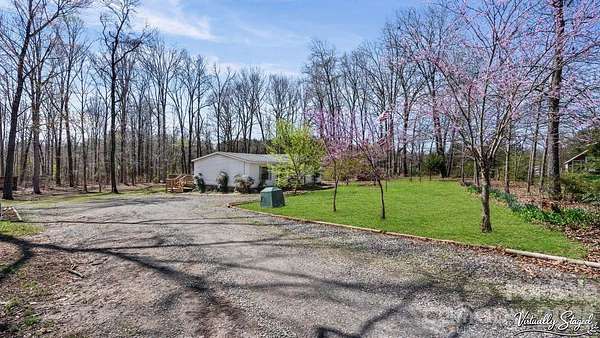 6.83 Acres of Land with Home for Sale in Statesville, North Carolina