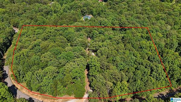 6.6 Acres of Land with Home for Sale in McCalla, Alabama