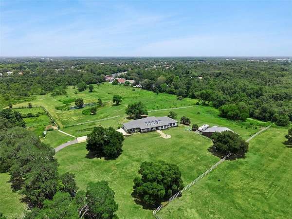 19.7 Acres of Land with Home for Sale in Oviedo, Florida