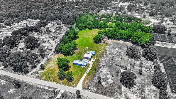 4.28 Acres of Land with Home for Sale in Mount Dora, Florida