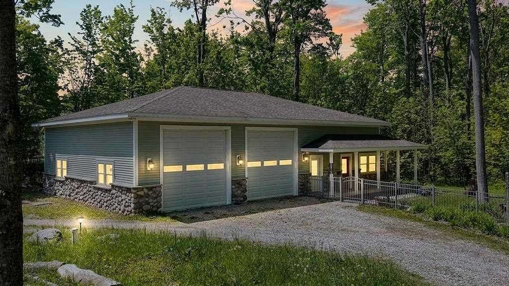 5 Acres of Land with Home for Sale in Charlevoix, Michigan