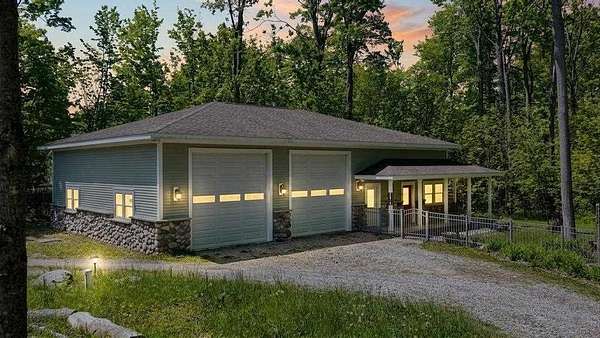 5 Acres of Land with Home for Sale in Charlevoix, Michigan