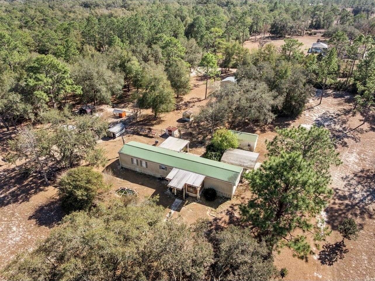 4.74 Acres of Land with Home for Sale in Williston, Florida