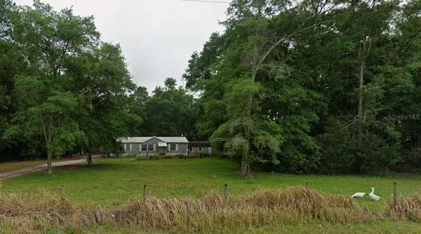 3.28 Acres of Land with Home for Sale in Bell, Florida