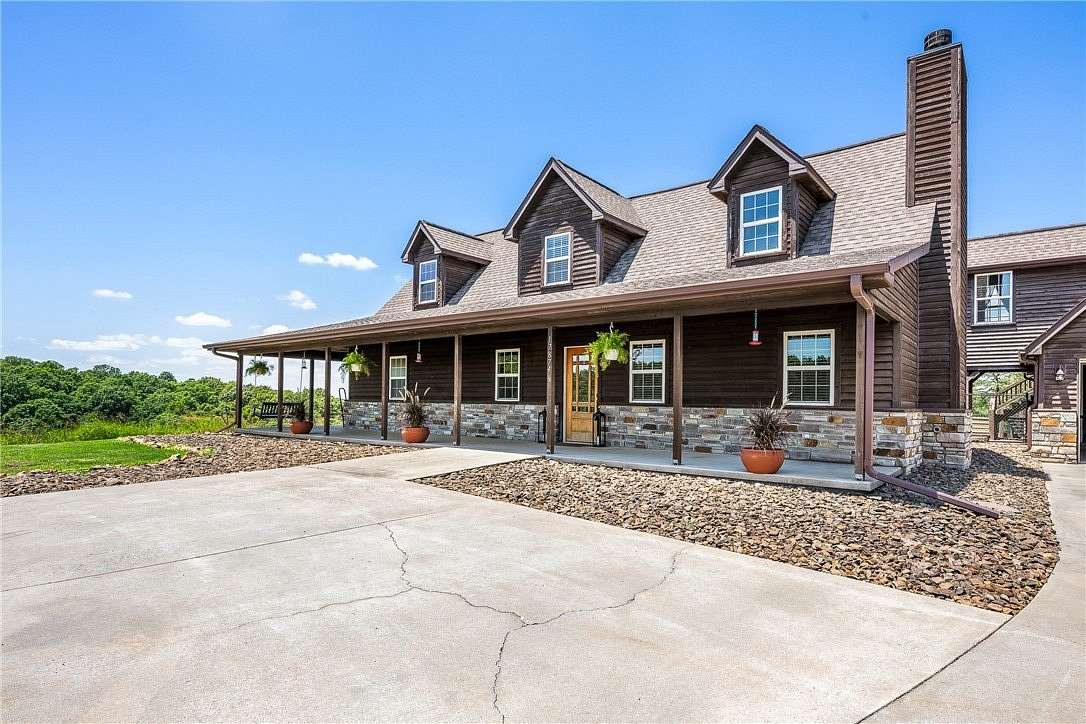 16 Acres of Recreational Land with Home for Sale in Rogers, Arkansas