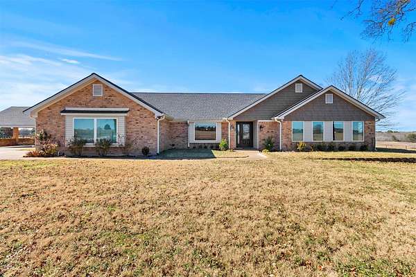 29.3 Acres of Agricultural Land with Home for Sale in Henderson, Texas