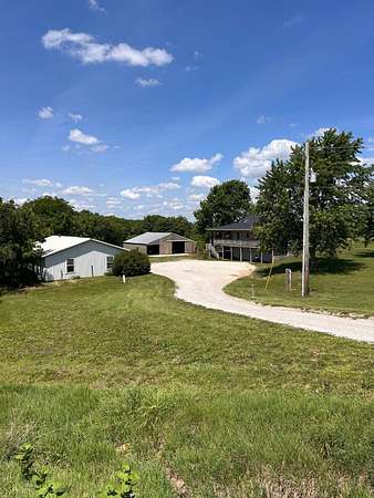 5.85 Acres of Land with Home for Sale in Jamesport, Missouri