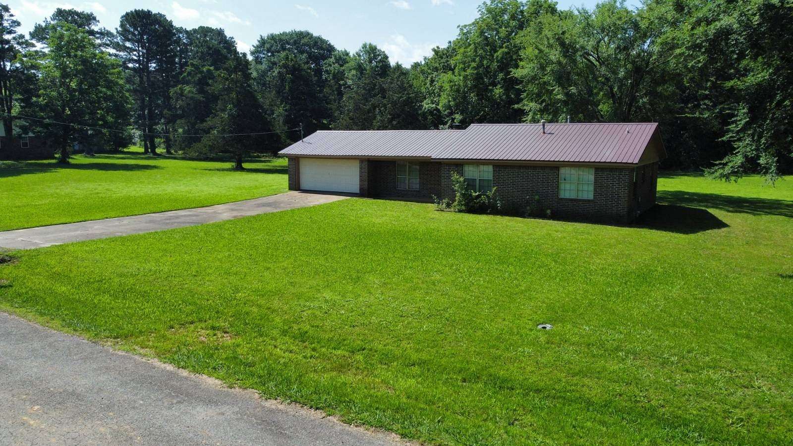 1.5 Acres of Land with Home for Auction in Paris, Arkansas