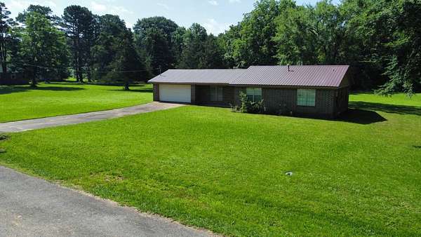 1.5 Acres of Land with Home for Auction in Paris, Arkansas