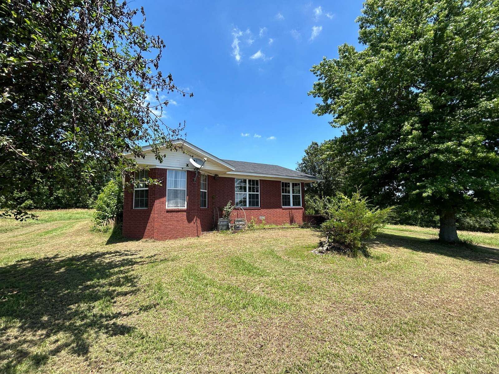 10 Acres of Land with Home for Auction in Mulberry, Arkansas