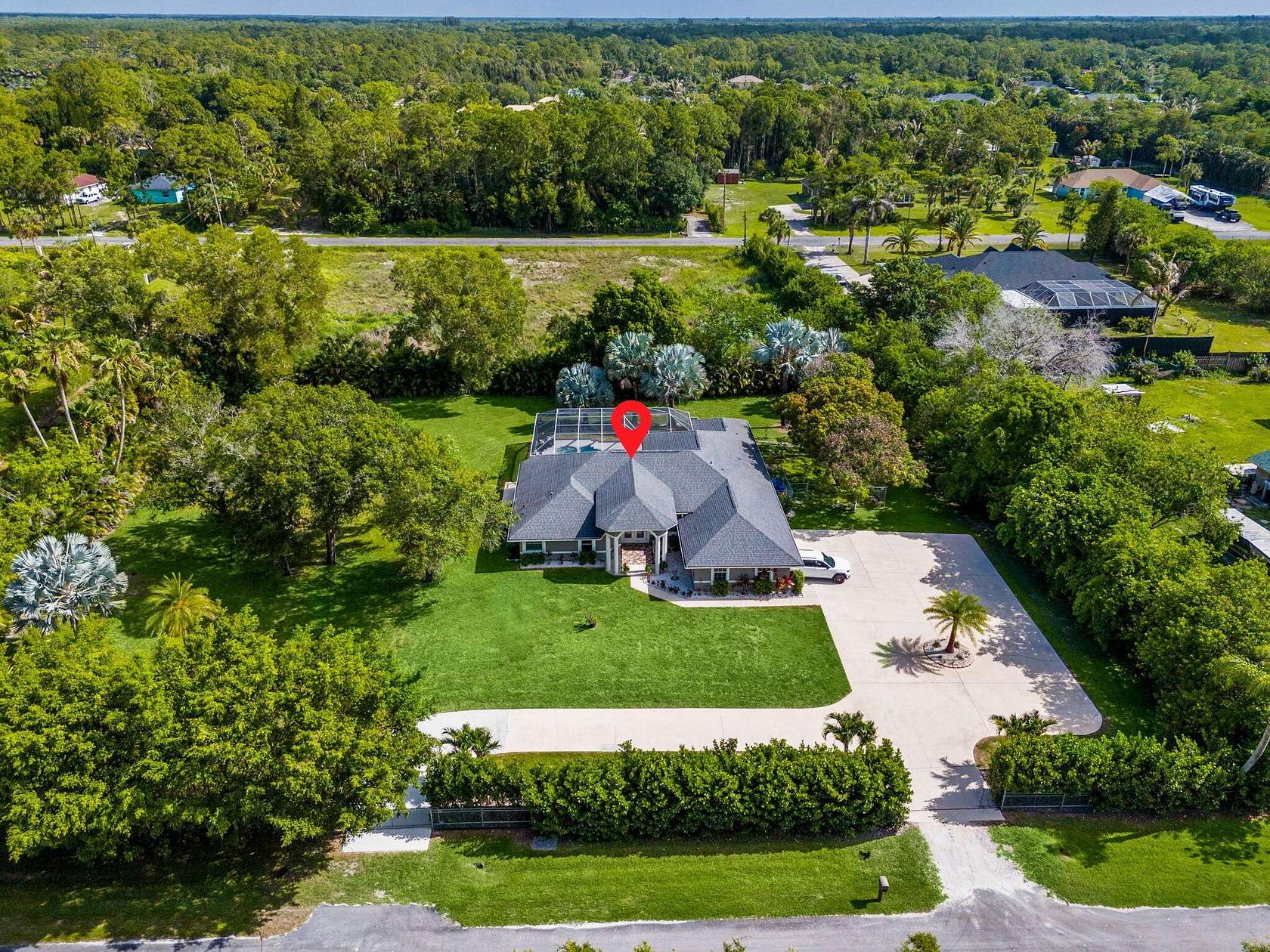 1.53 Acres of Land with Home for Sale in Loxahatchee Groves, Florida