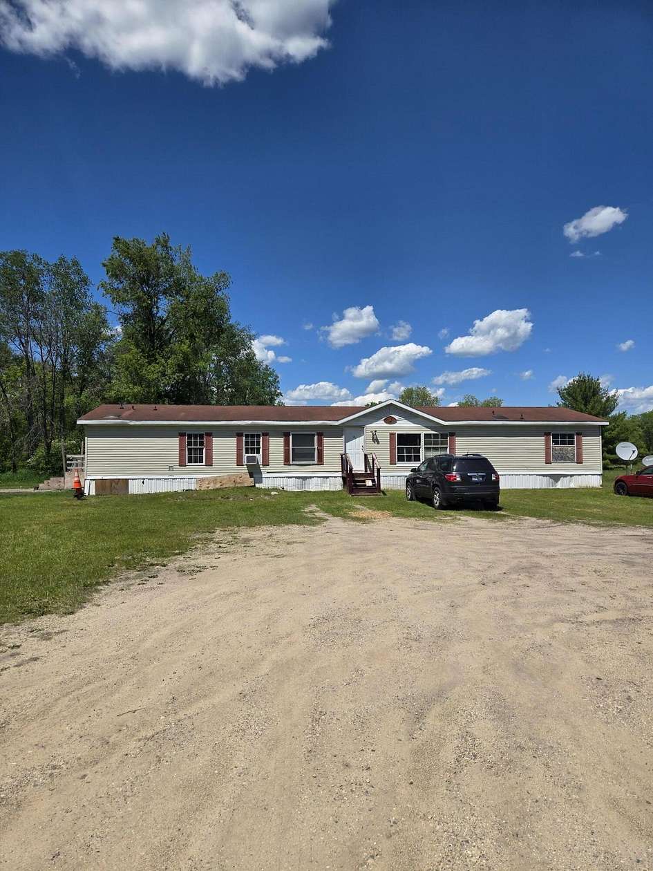 5 Acres of Land with Home for Sale in Chase, Michigan