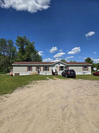 5 Acres of Land with Home for Sale in Chase, Michigan