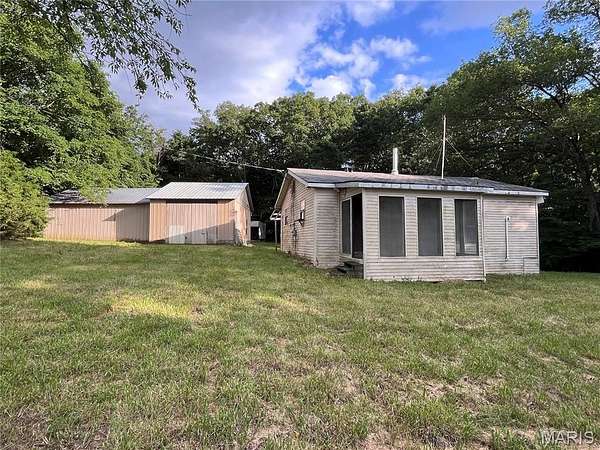4.6 Acres of Land with Home for Sale in Hawk Point, Missouri