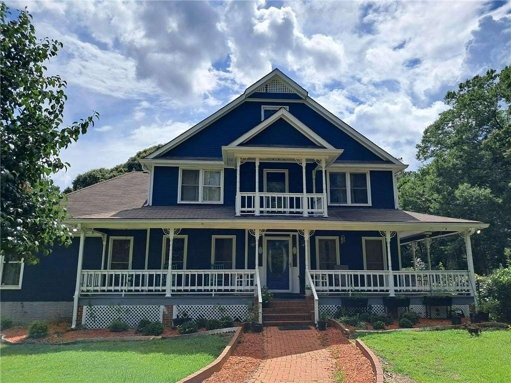5.25 Acres of Land with Home for Sale in Ellenwood, Georgia