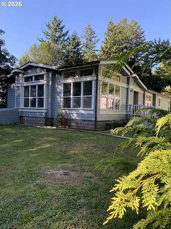 3.28 Acres of Land with Home for Sale in Gold Beach, Oregon