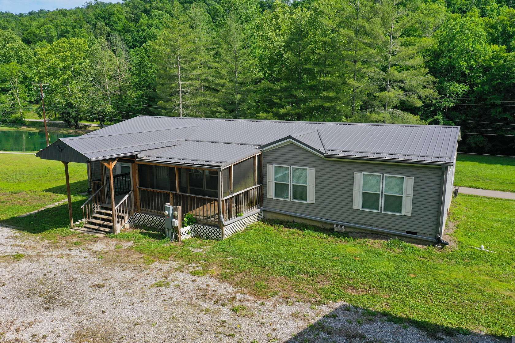 14.2 Acres of Land with Home for Sale in Manchester, Kentucky