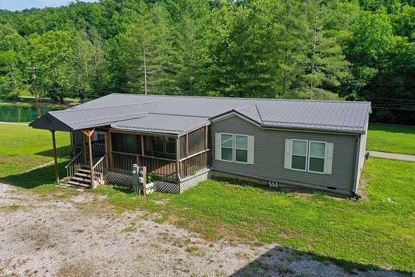 14.2 Acres of Land with Home for Sale in Manchester, Kentucky