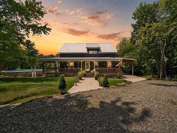 7.5 Acres of Land with Home for Sale in Burns, Tennessee