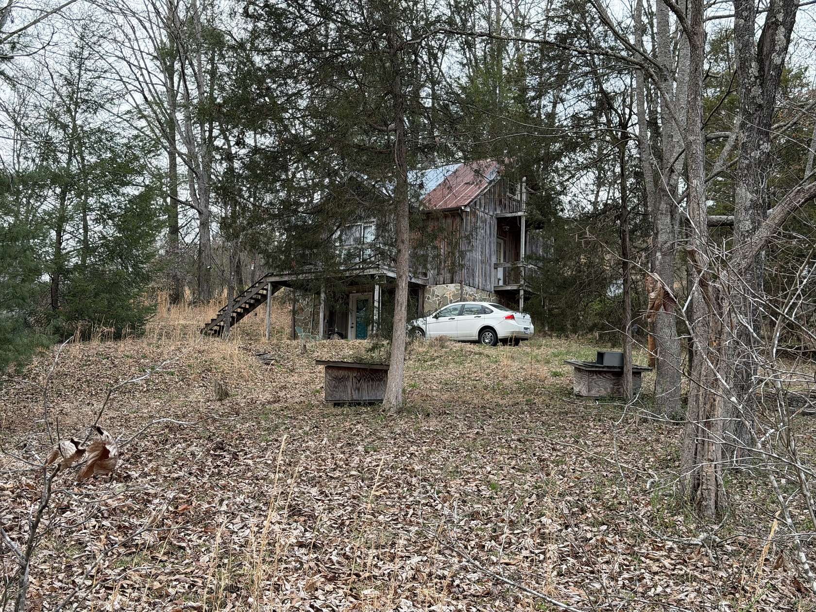 3.86 Acres of Land with Home for Sale in Lancing, Tennessee