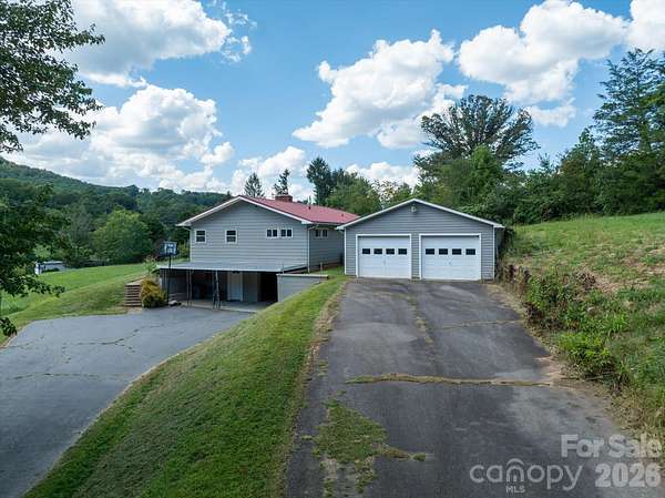3.3 Acres of Land with Home for Sale in Asheville, North Carolina