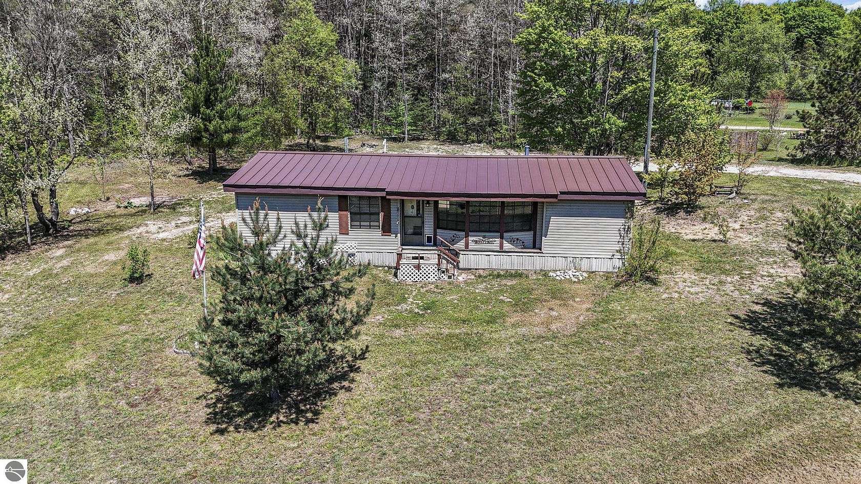 2.7 Acres of Land with Home for Sale in Bellaire, Michigan