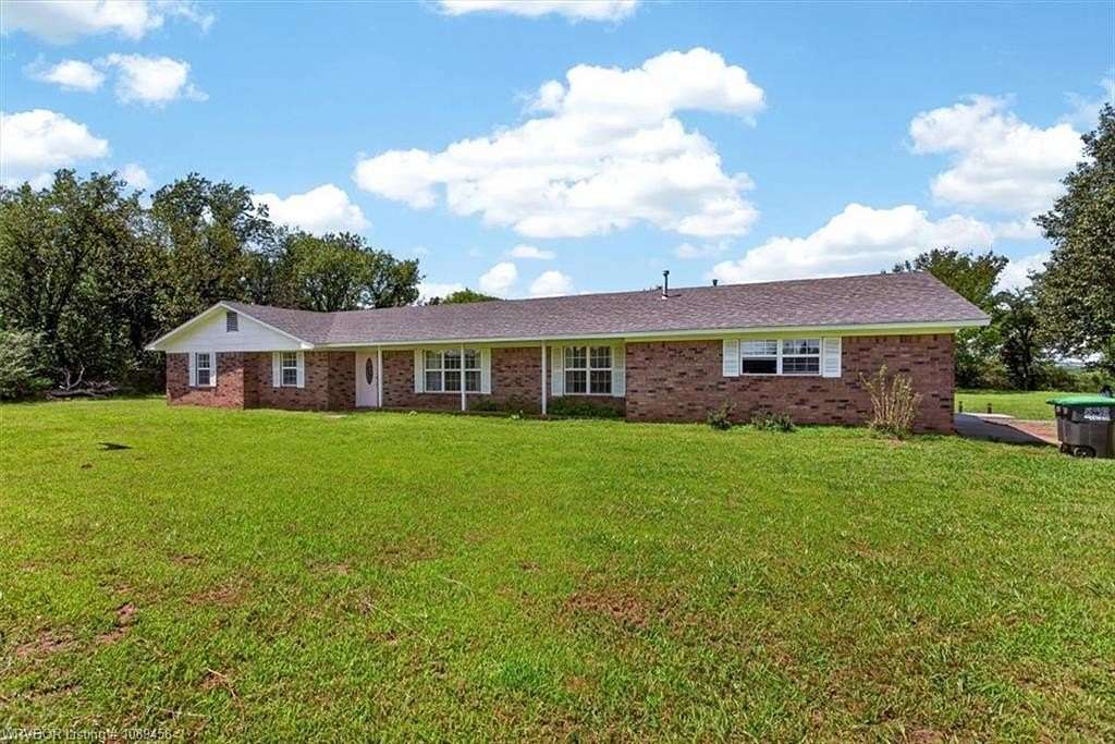 13.8 Acres of Land with Home for Sale in Poteau, Oklahoma