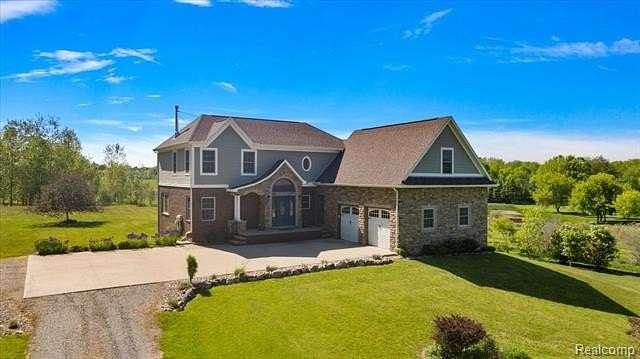 3.2 Acres of Land with Home for Sale in Hadley Township, Michigan