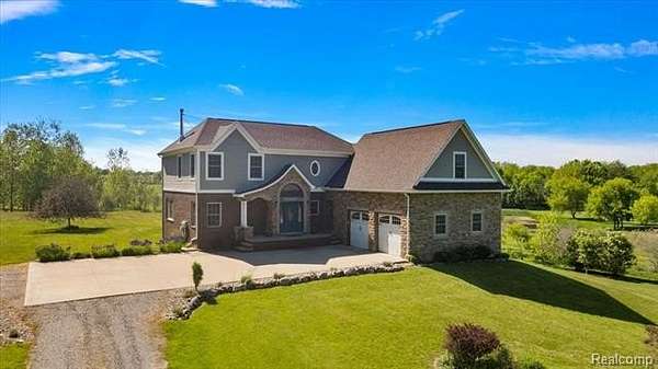 3.2 Acres of Land with Home for Sale in Hadley Township, Michigan