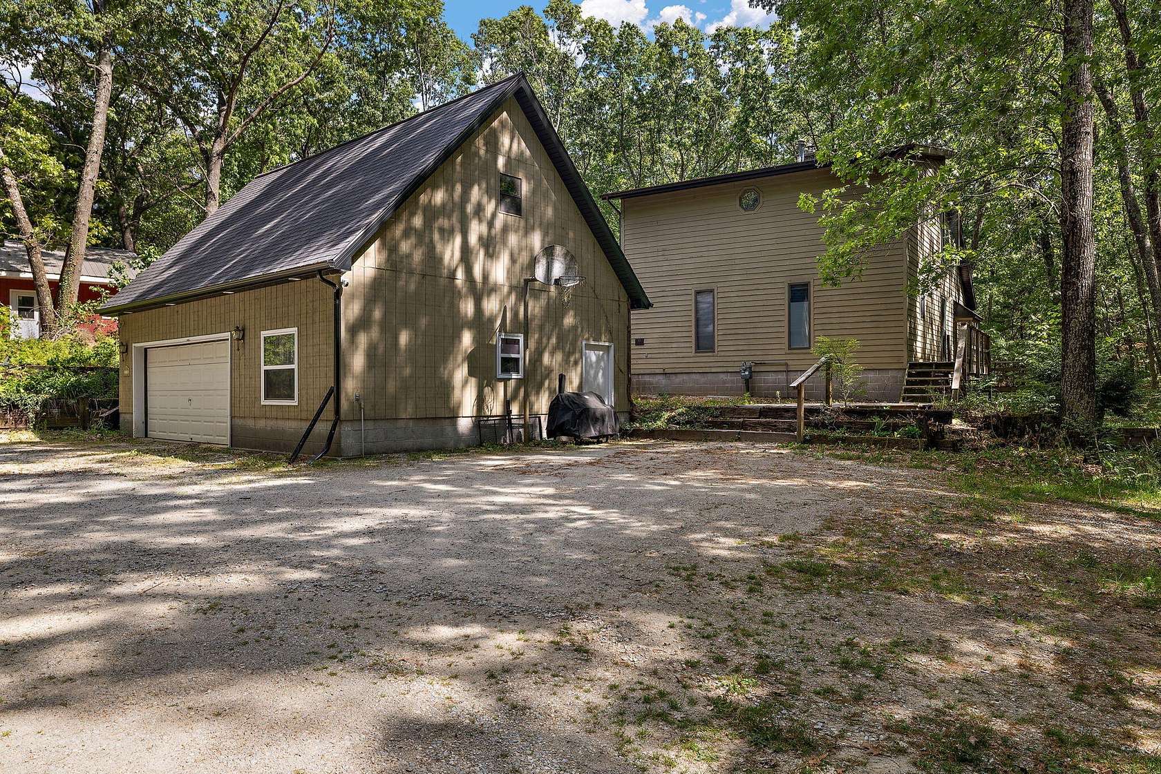 10.5 Acres of Land with Home for Sale in Twin Lake, Michigan