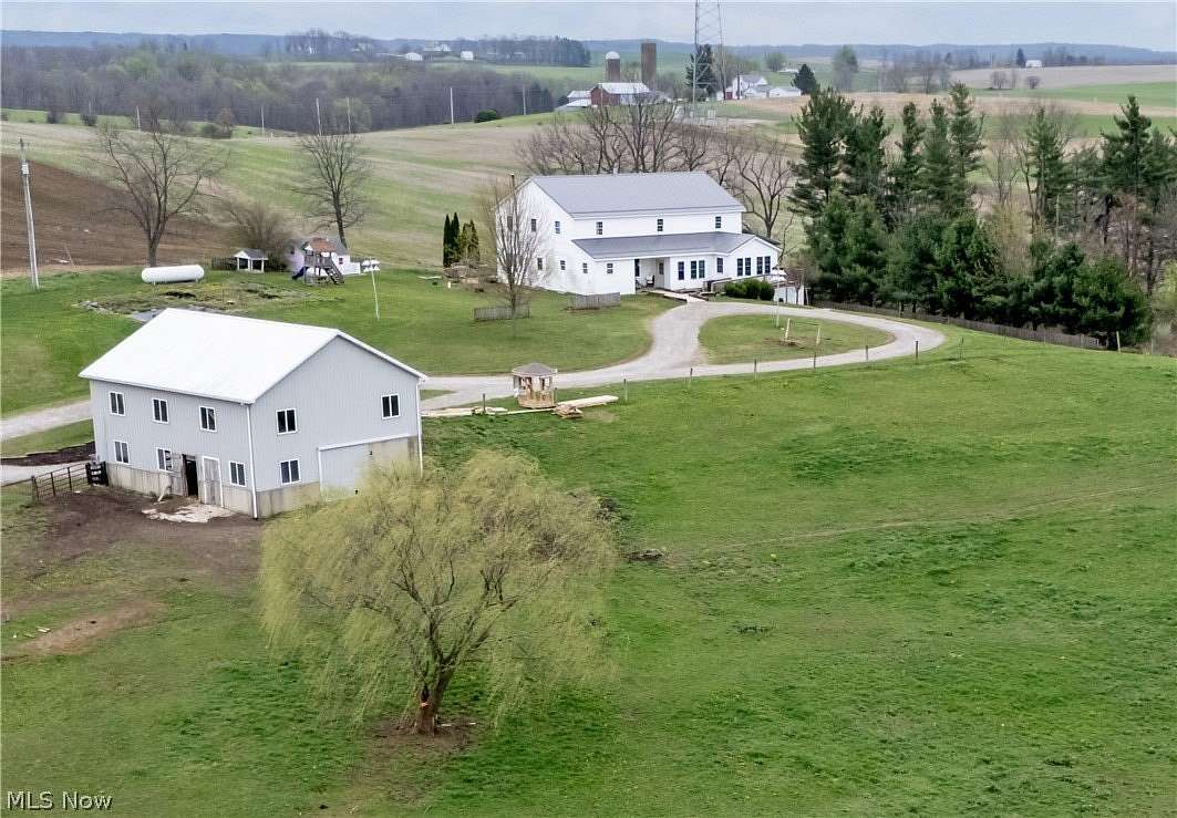 10 Acres of Land with Home for Auction in Brinkhaven, Ohio