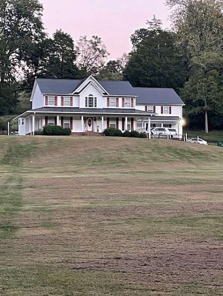 1.66 Acres of Land with Home for Sale in Lawrenceburg, Tennessee