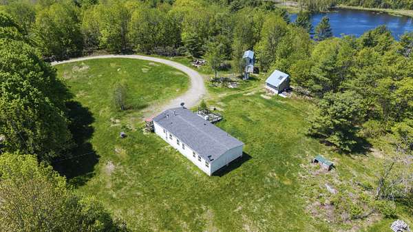 16 Acres of Land with Home for Sale in Liberty, Maine