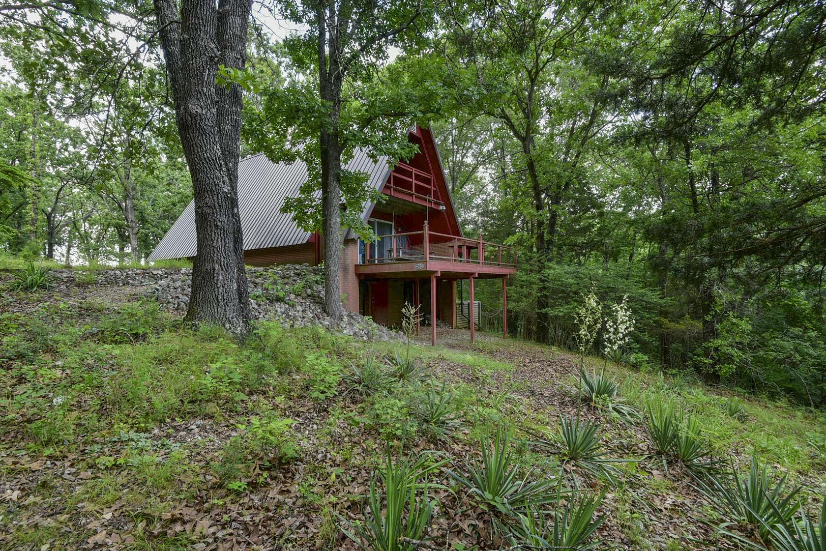 17 Acres of Land with Home for Sale in Reeds Spring, Missouri