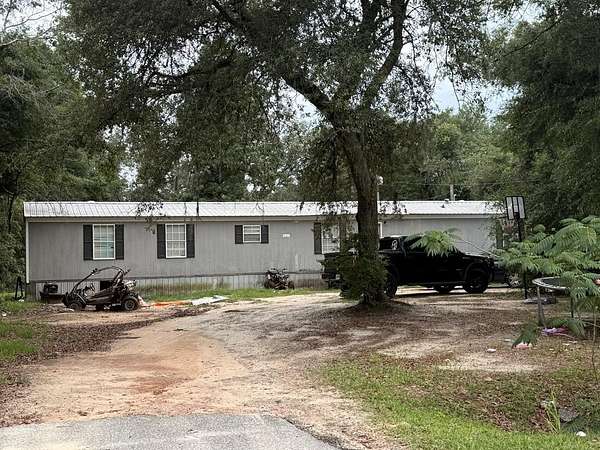 1.57 Acres of Land with Home for Sale in Douglas, Georgia